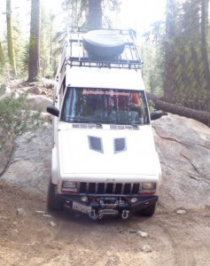 Cropped_Jeep_on_Rock
